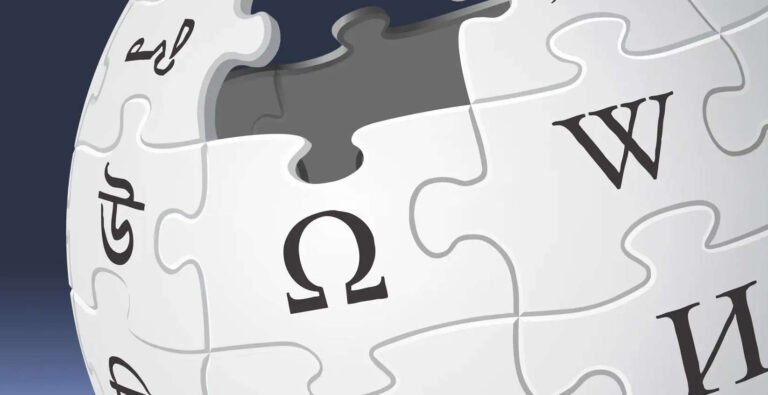 Wikipedia perde traffico. Logo di Wikipedia con tassello mancante, simbolo del calo di traffico e dell’impatto dell’intelligenza artificiale.