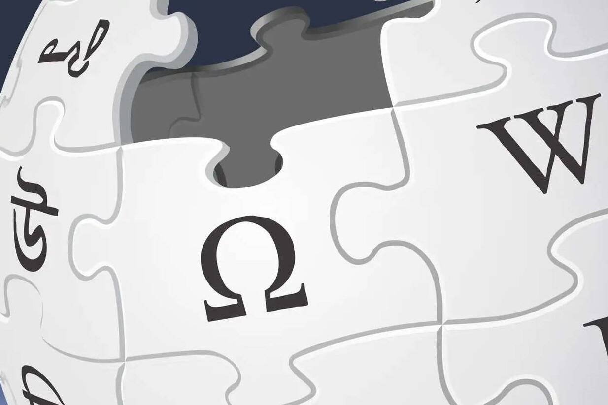 Wikipedia perde traffico. Logo di Wikipedia con tassello mancante, simbolo del calo di traffico e dell’impatto dell’intelligenza artificiale.